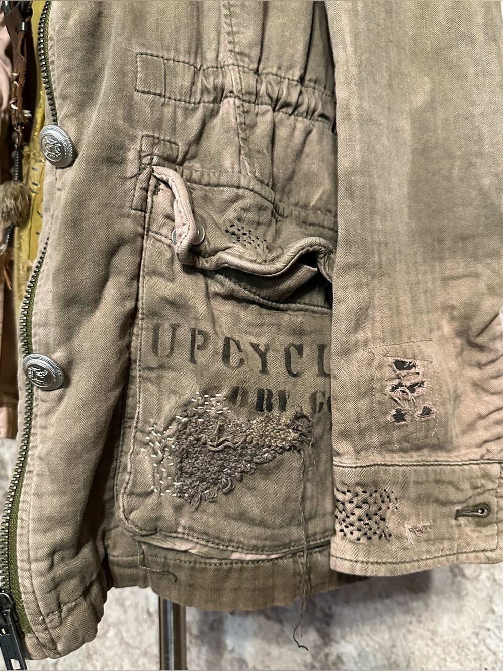 heavily mended salvaged jacket